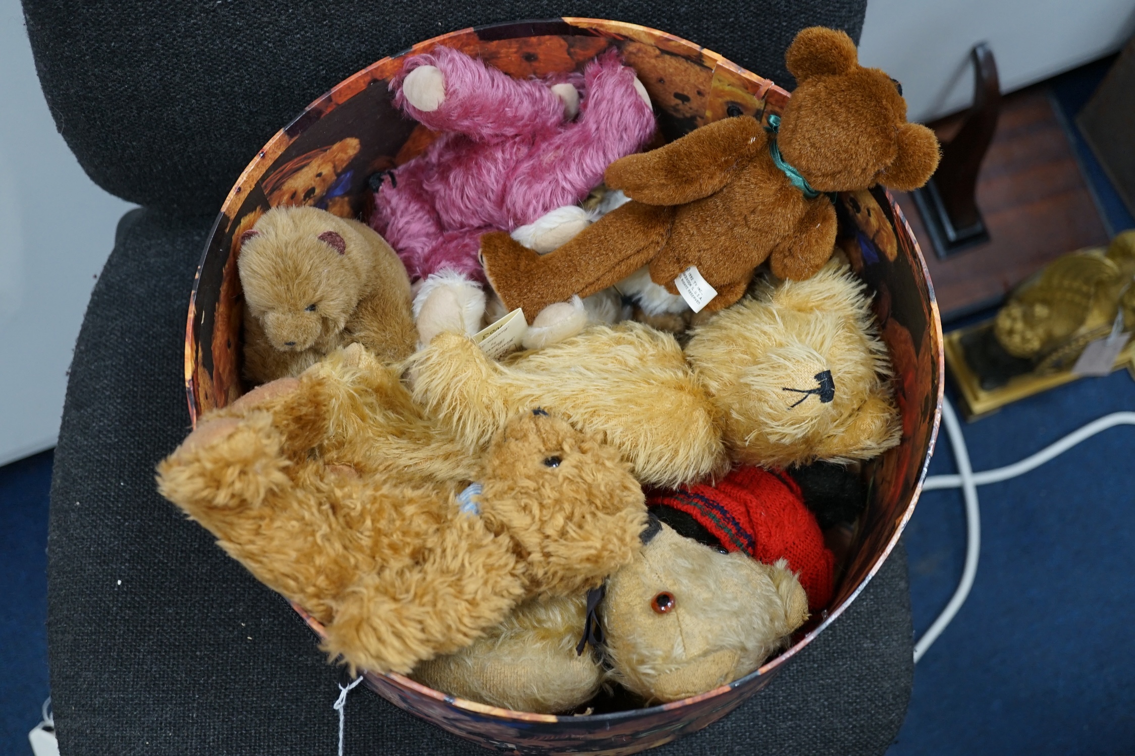 A collection of twenty-six modern teddy bears by The English Teddy Bear Co., Honey Hill Bears, Merrythought, Robin Rive, Steiff, etc.